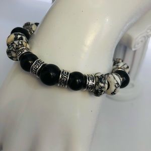7” Shungite, howlite, shell and pewter stretch bracelet.